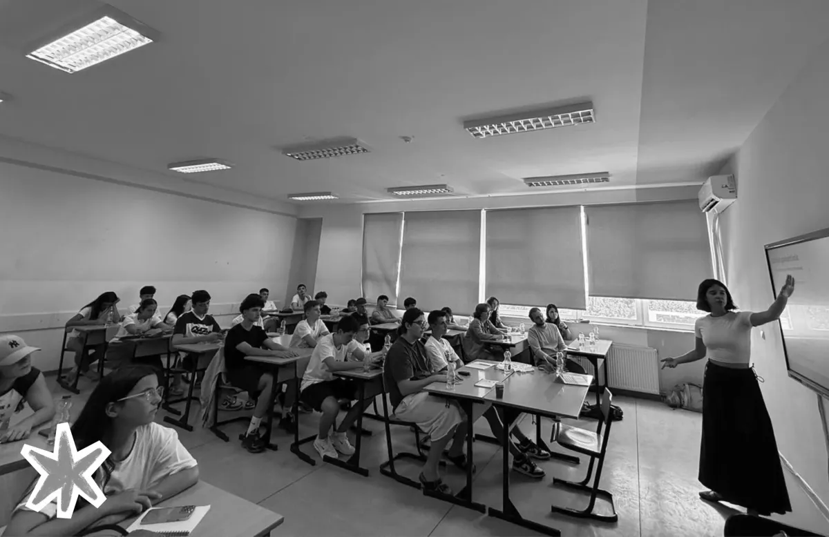 Teaching a classroom of students at Braincamp